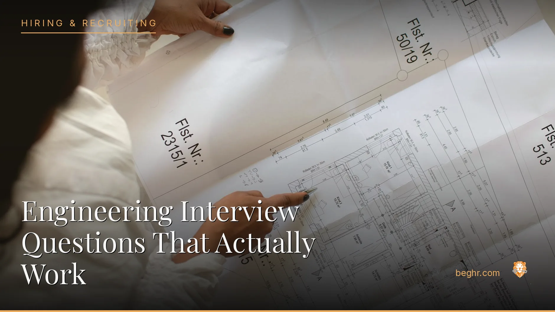Engineers reviewing technical drawings in a modern office