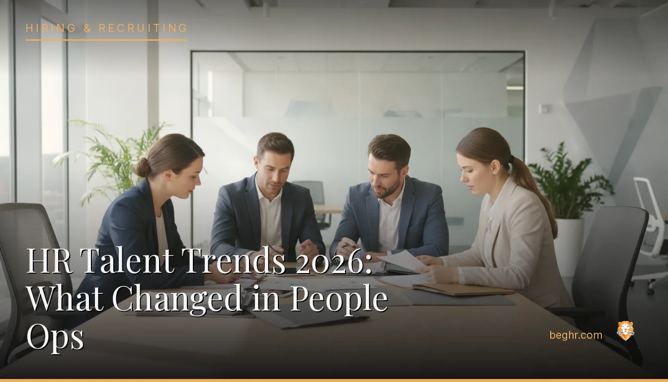 An HR team reviewing employee documents in a bright modern office