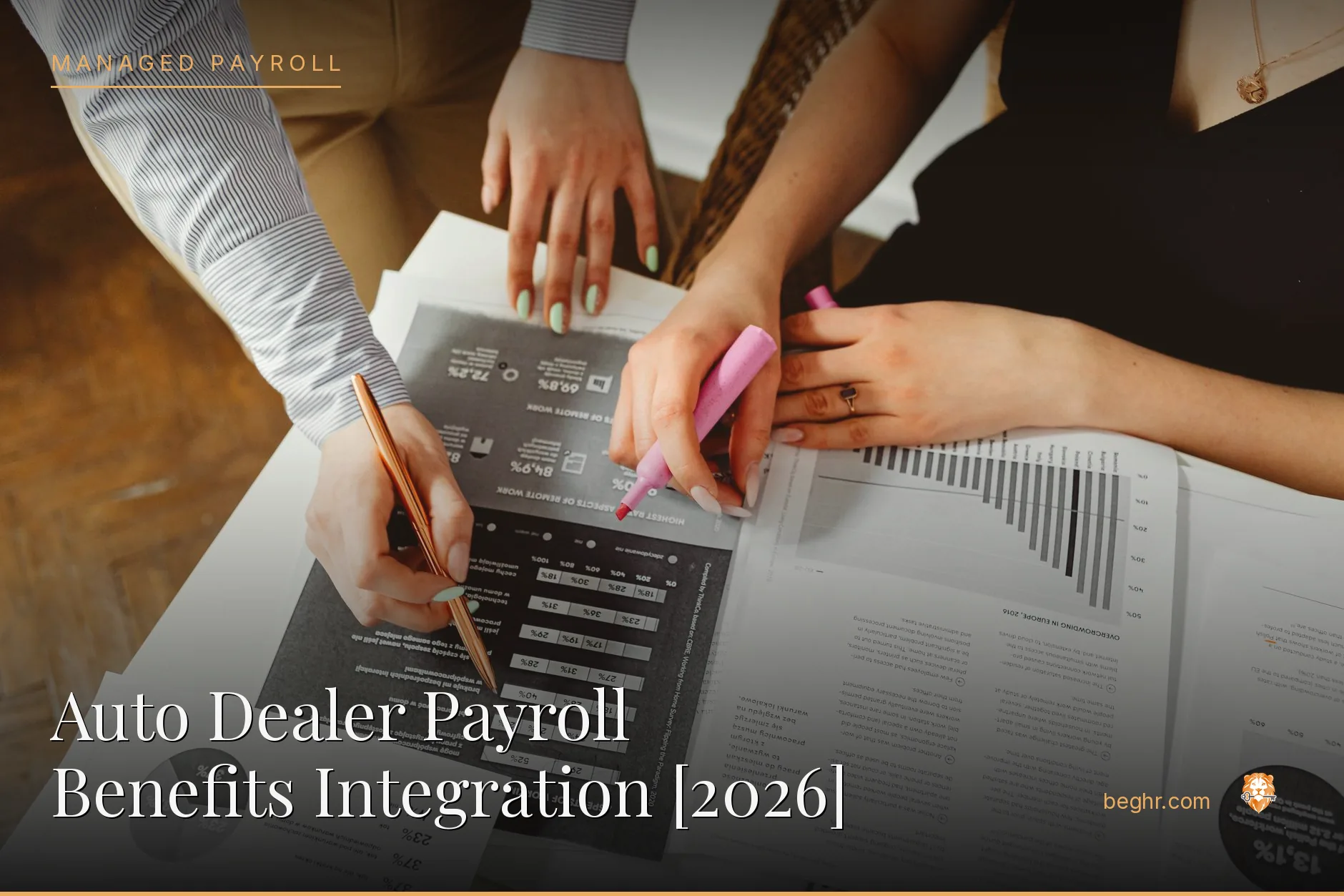 Business professionals reviewing payroll and HR documents in a bright modern office