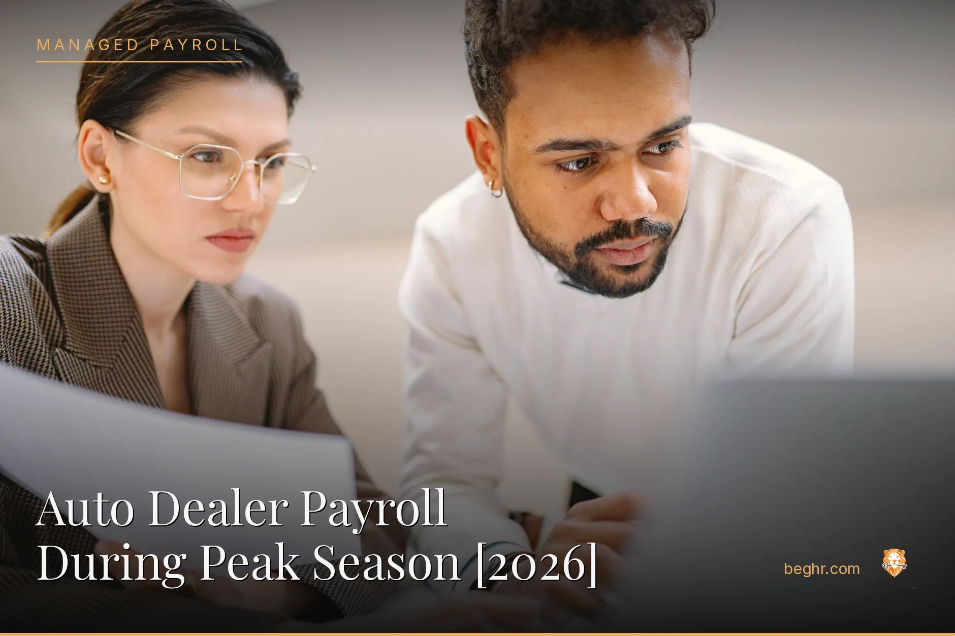 Business professionals reviewing payroll and HR documents in a bright modern office
