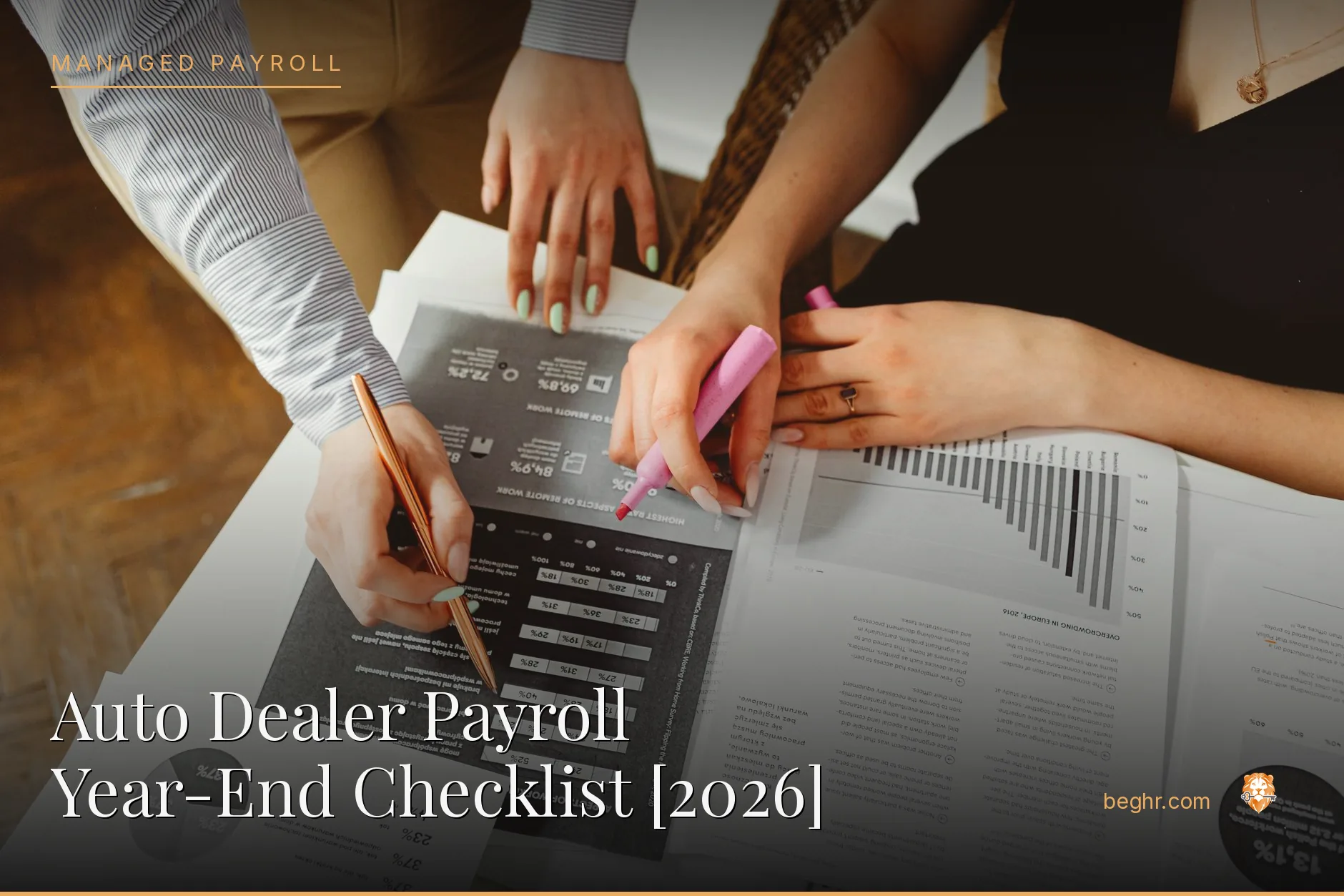 Business professionals reviewing payroll and HR documents in a bright modern office