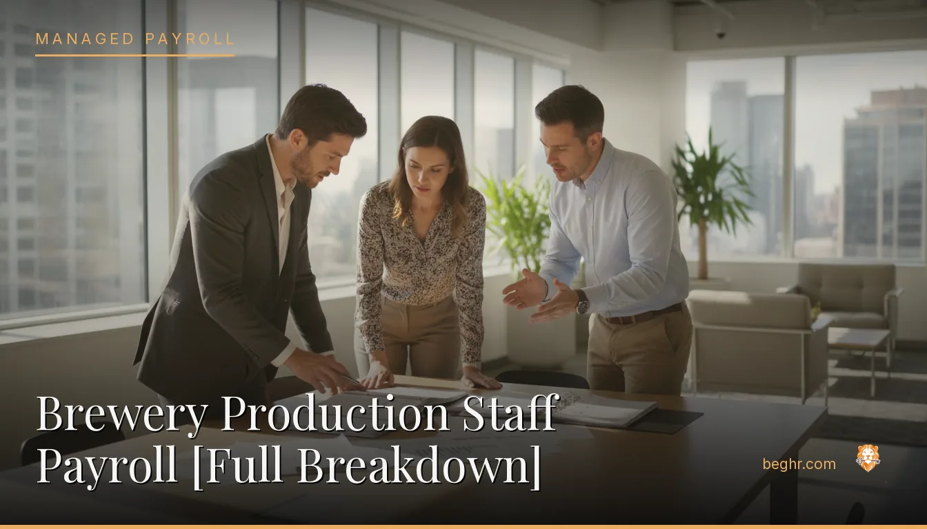 Business professionals reviewing payroll and HR documents in a bright modern office