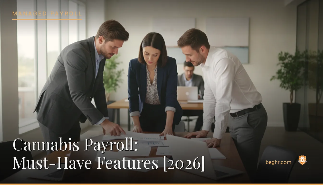 Business professionals reviewing payroll and HR documents in a bright modern office