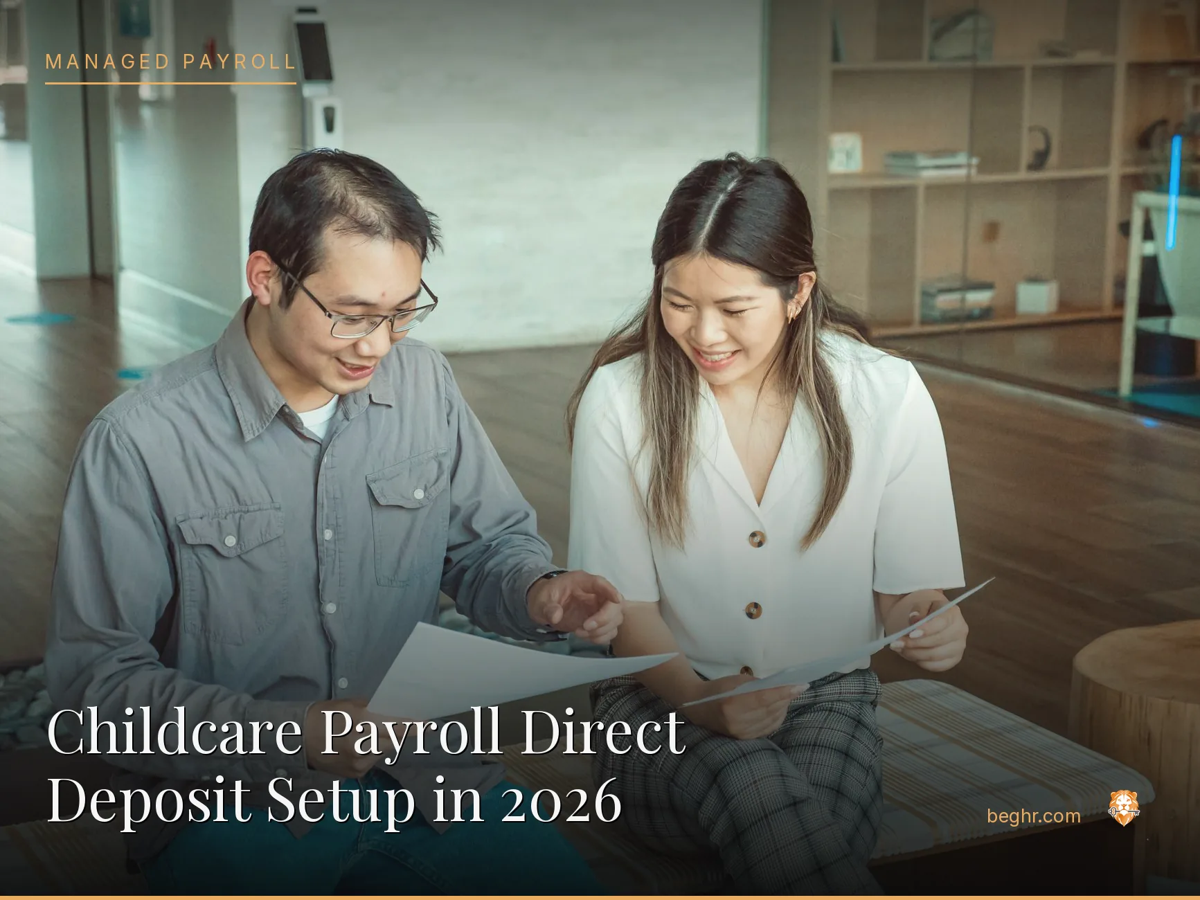 Business professionals reviewing payroll and HR documents in a bright modern office