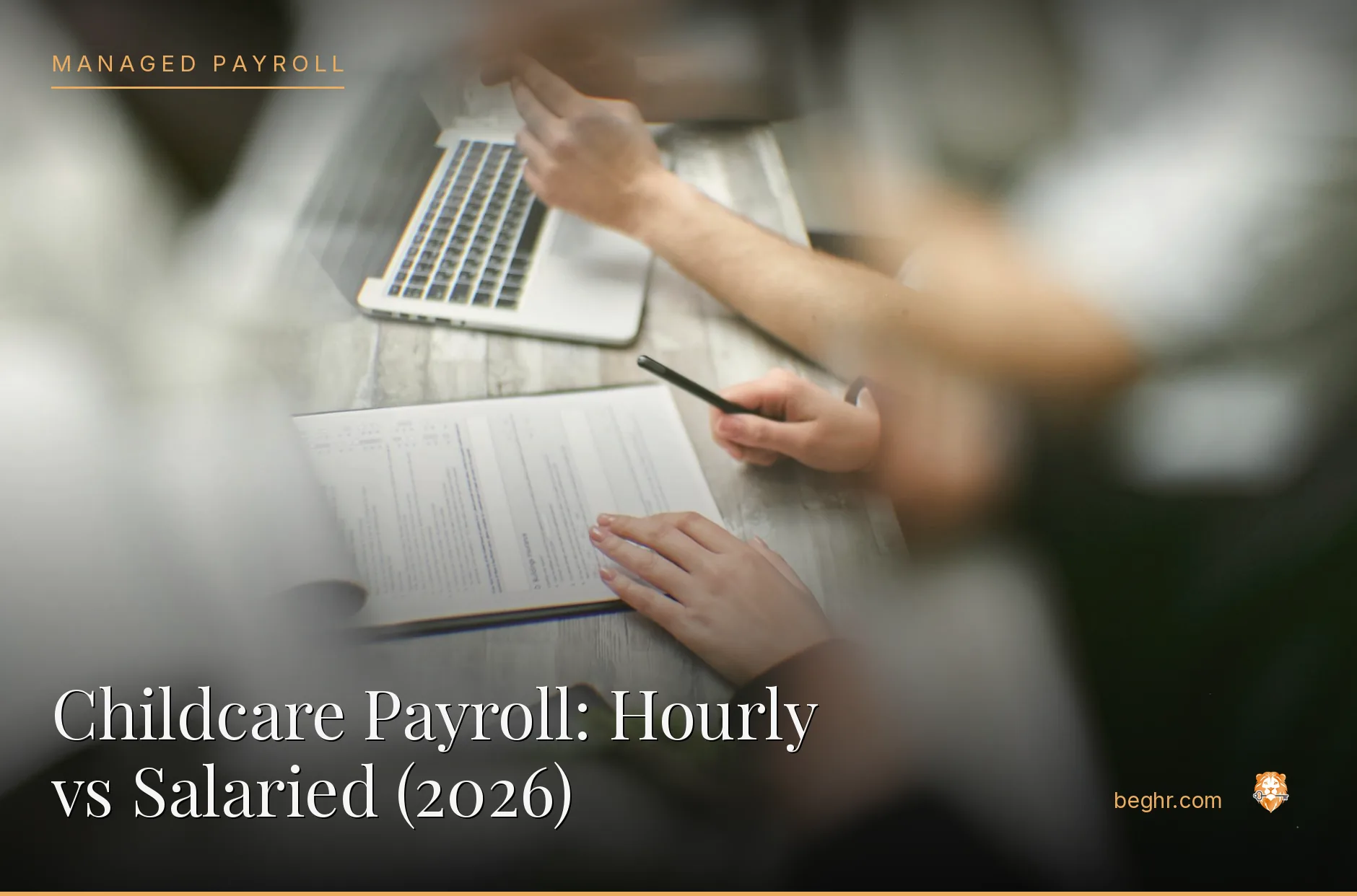 Business professionals reviewing payroll and HR documents in a bright modern office