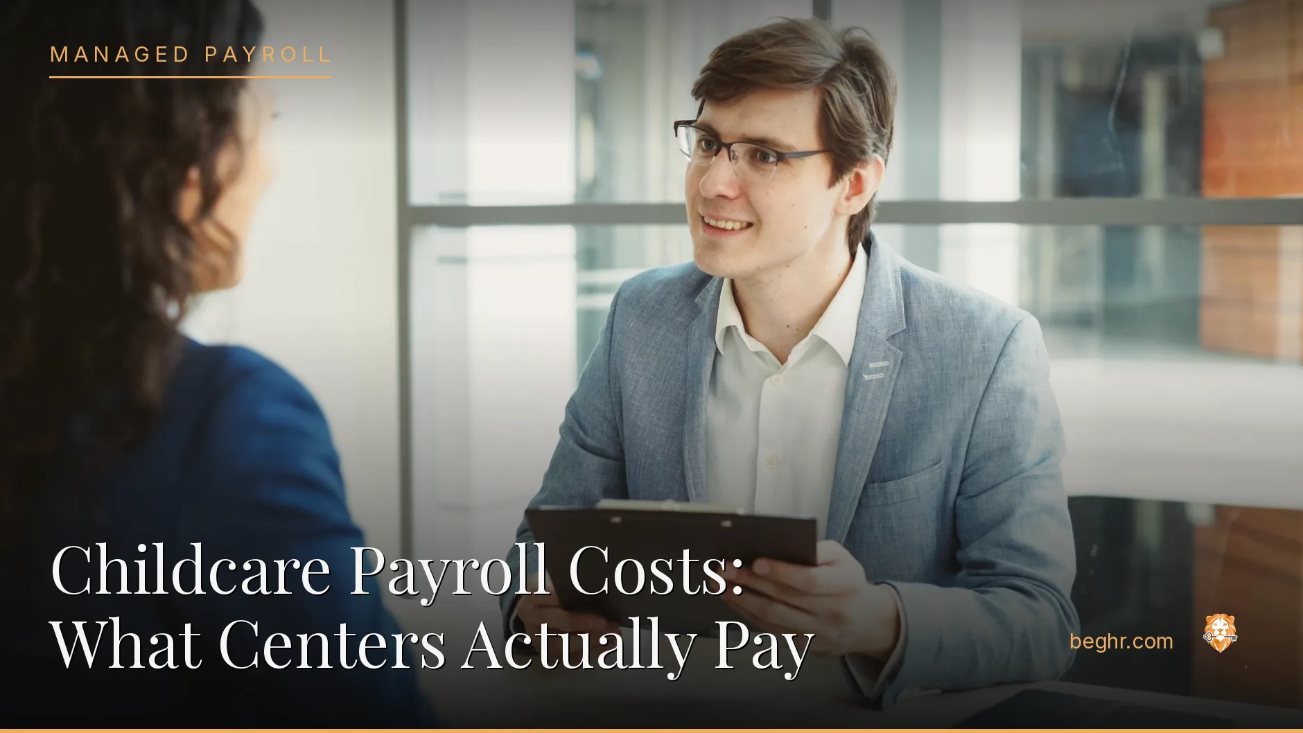 Business professionals reviewing payroll and HR documents in a bright modern office