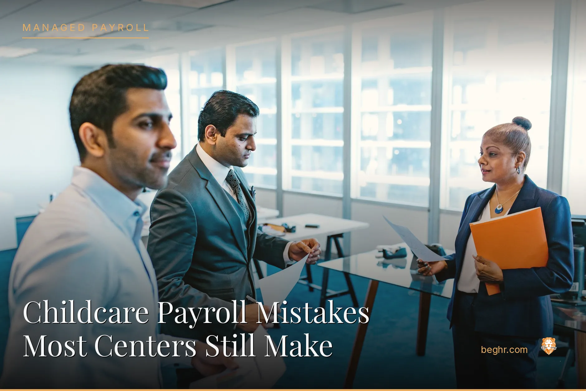 Business professionals reviewing payroll and HR documents in a bright modern office