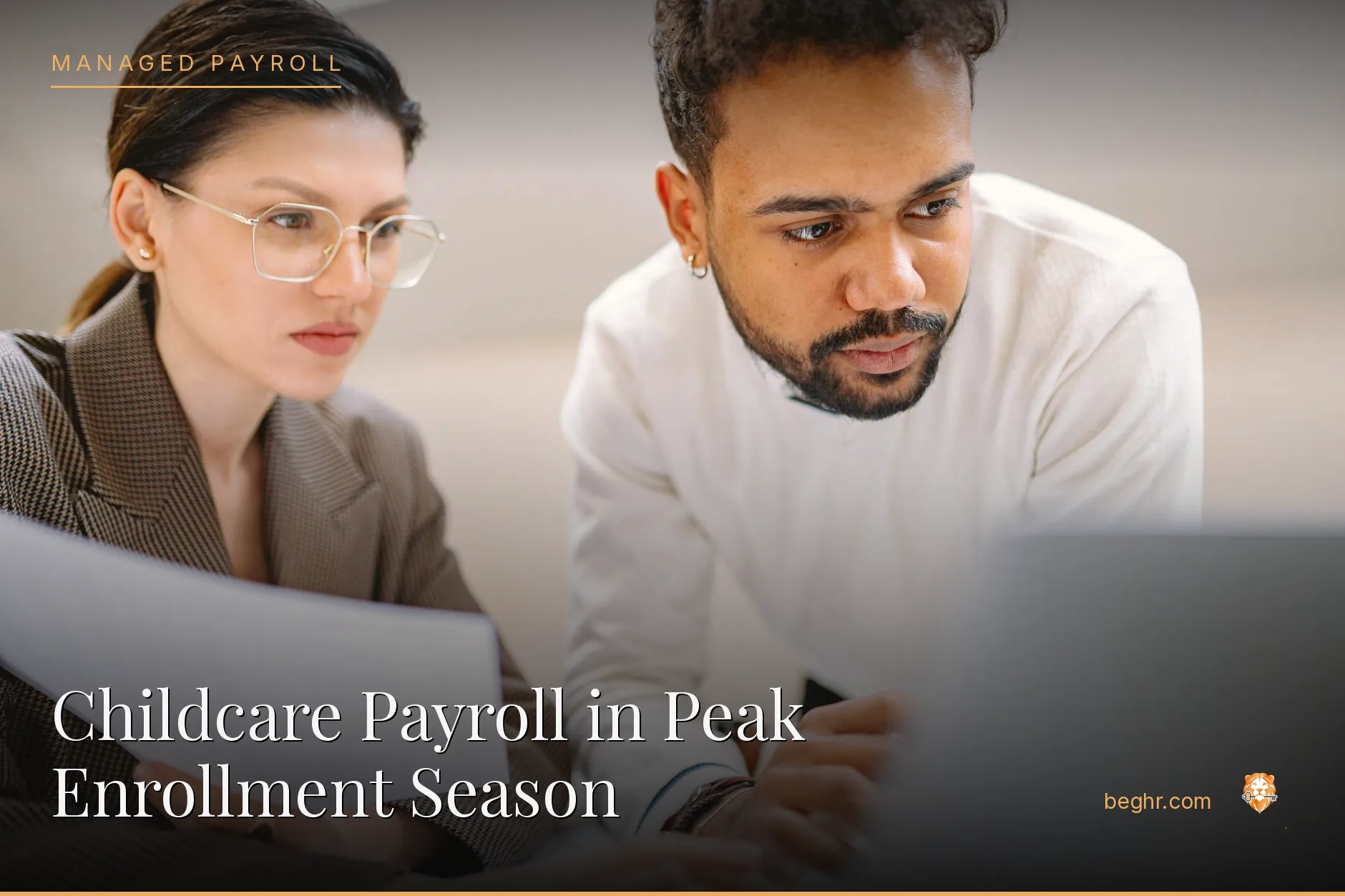 Business professionals reviewing payroll and HR documents in a bright modern office