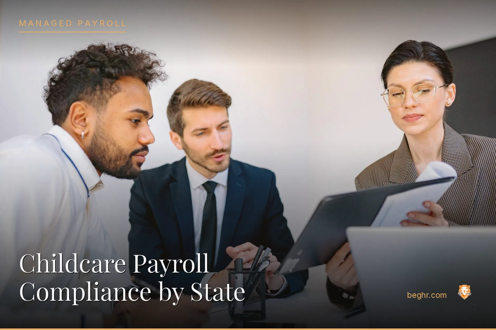 Business professionals reviewing payroll and HR documents in a bright modern office