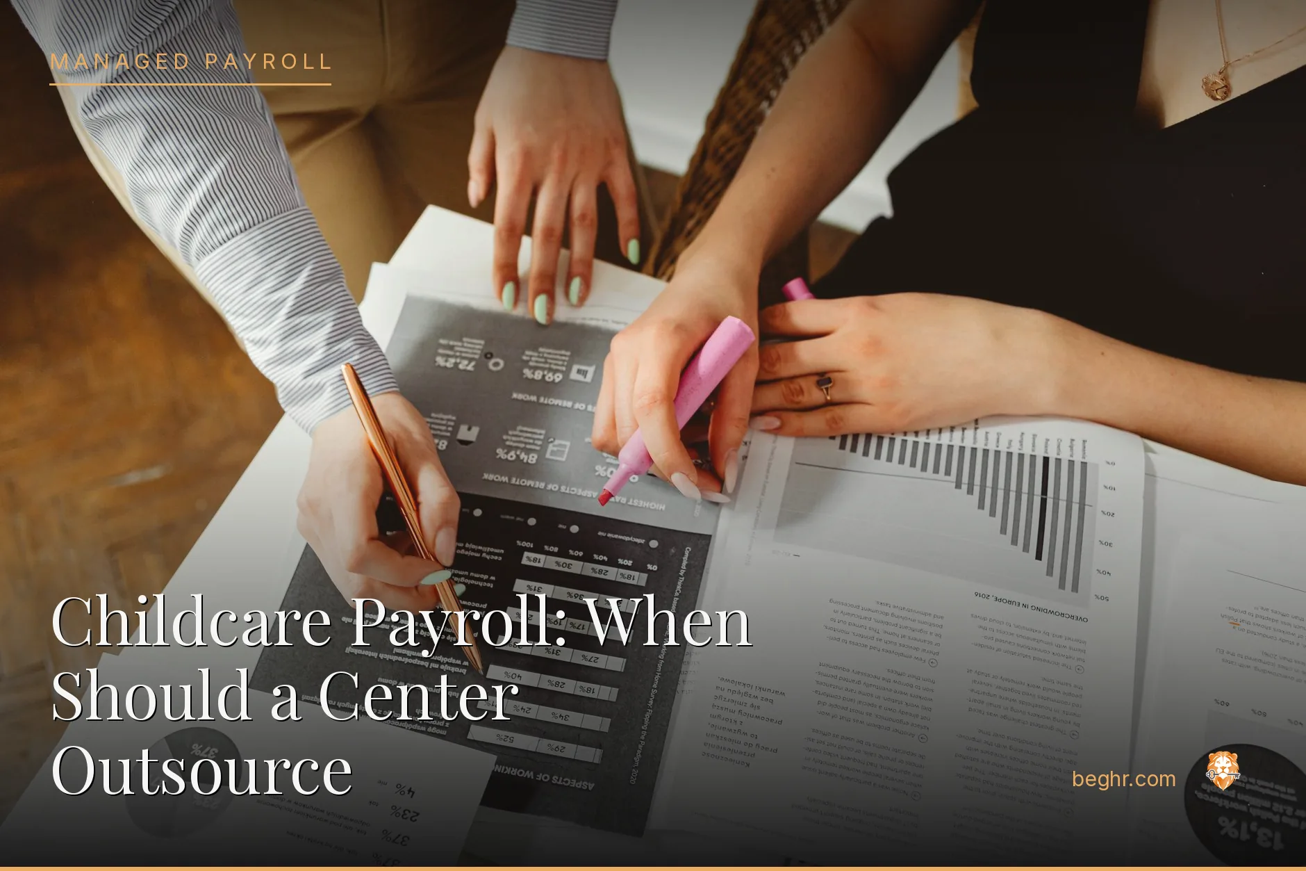 Business professionals reviewing payroll and HR documents in a bright modern office