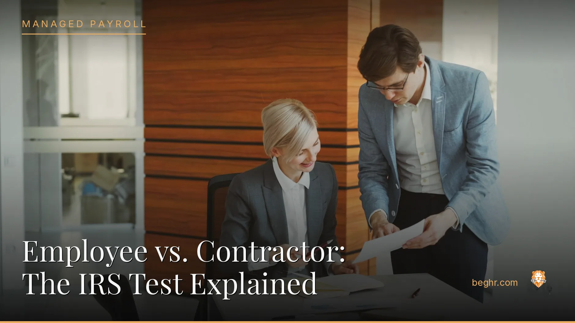 Business professionals reviewing payroll and HR documents in a bright modern office