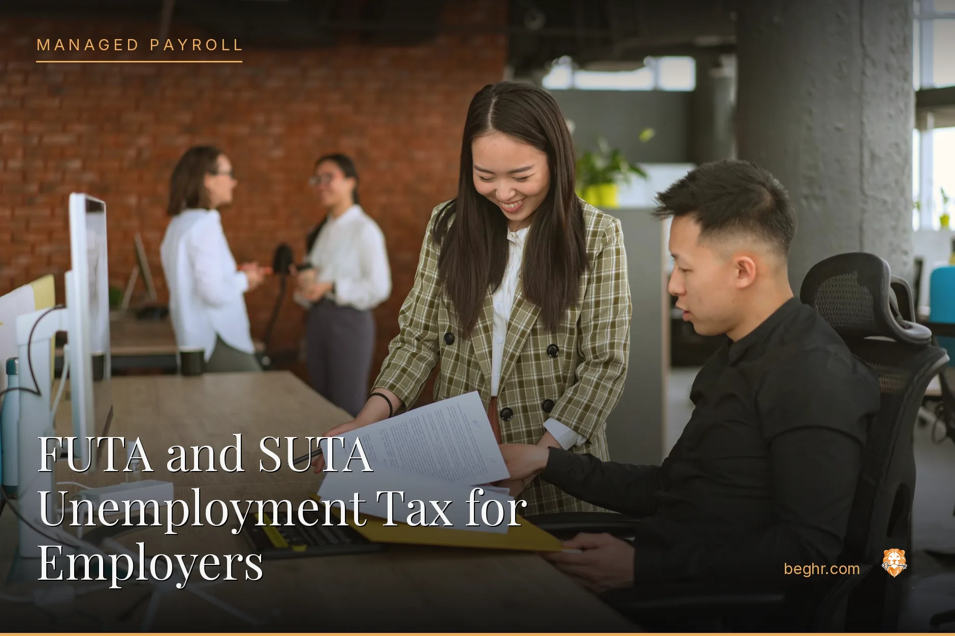 Business professionals reviewing payroll and HR documents in a bright modern office