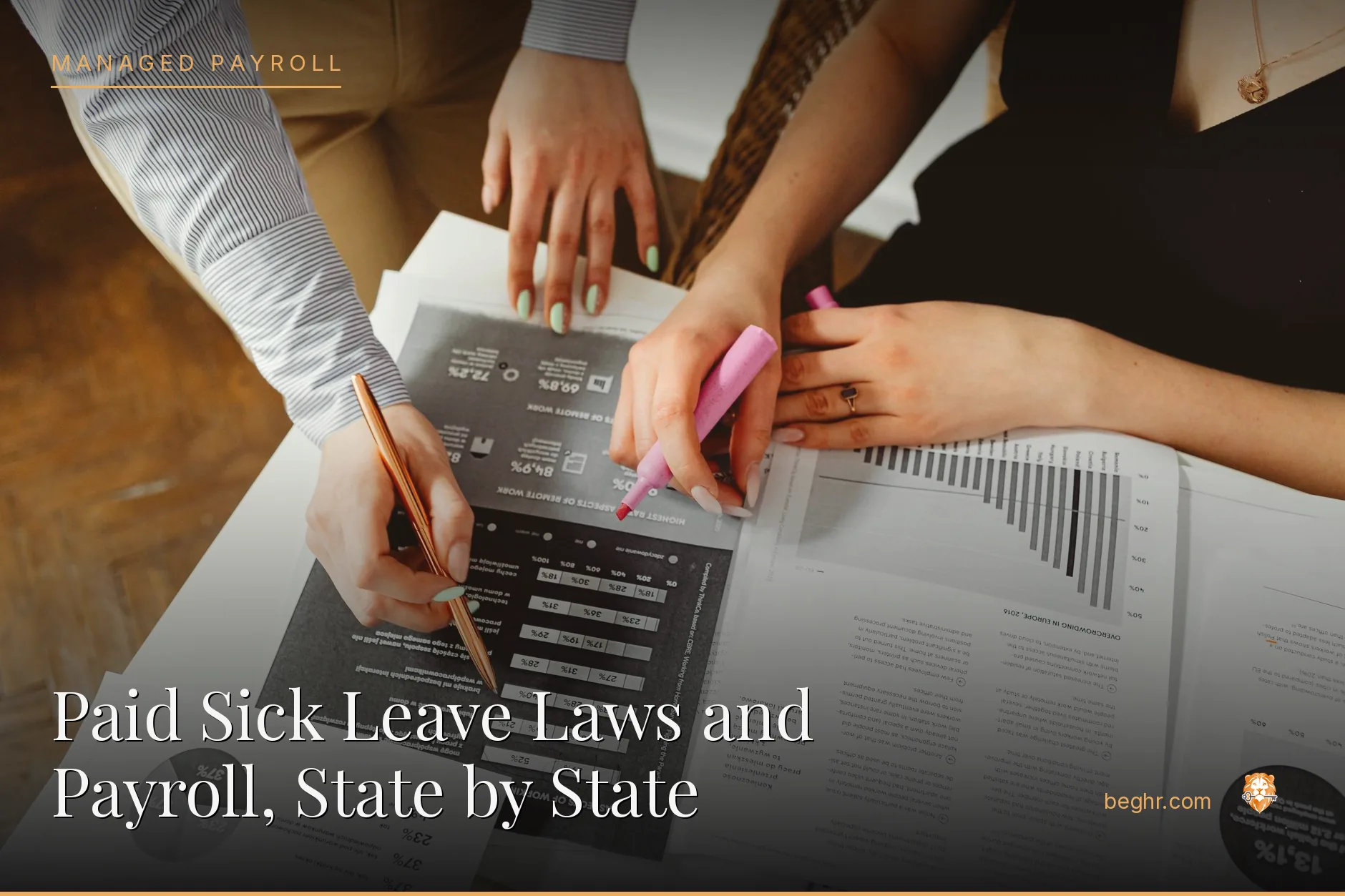 Business professionals reviewing payroll and HR documents in a bright modern office