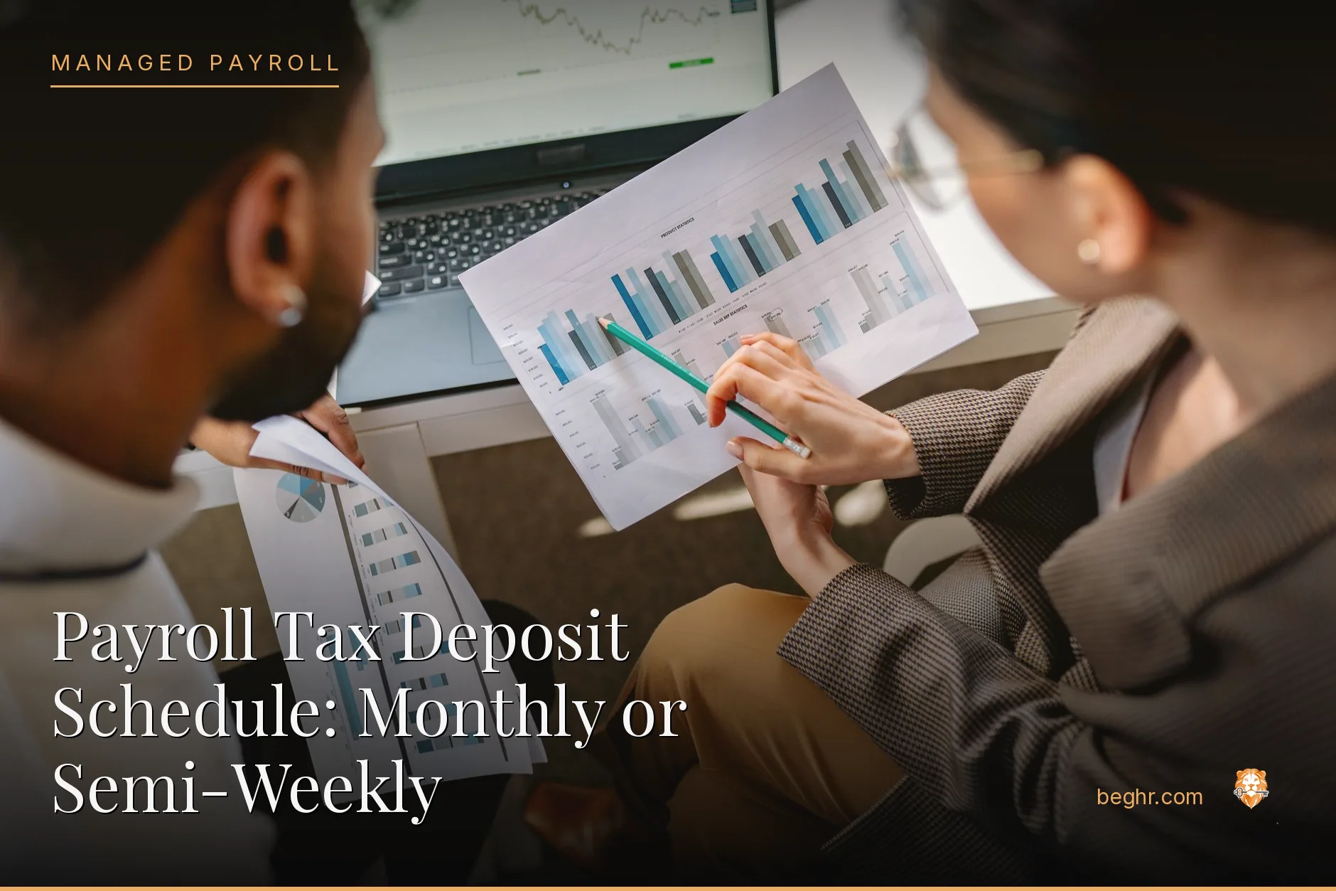 Business professionals reviewing payroll and HR documents in a bright modern office