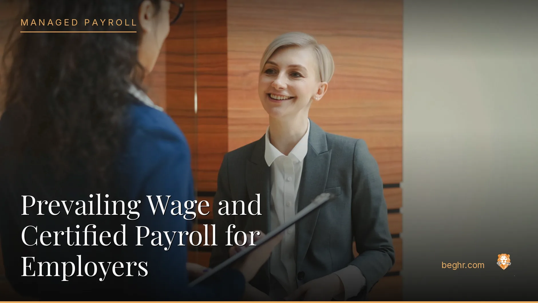 Business professionals reviewing payroll and HR documents in a bright modern office