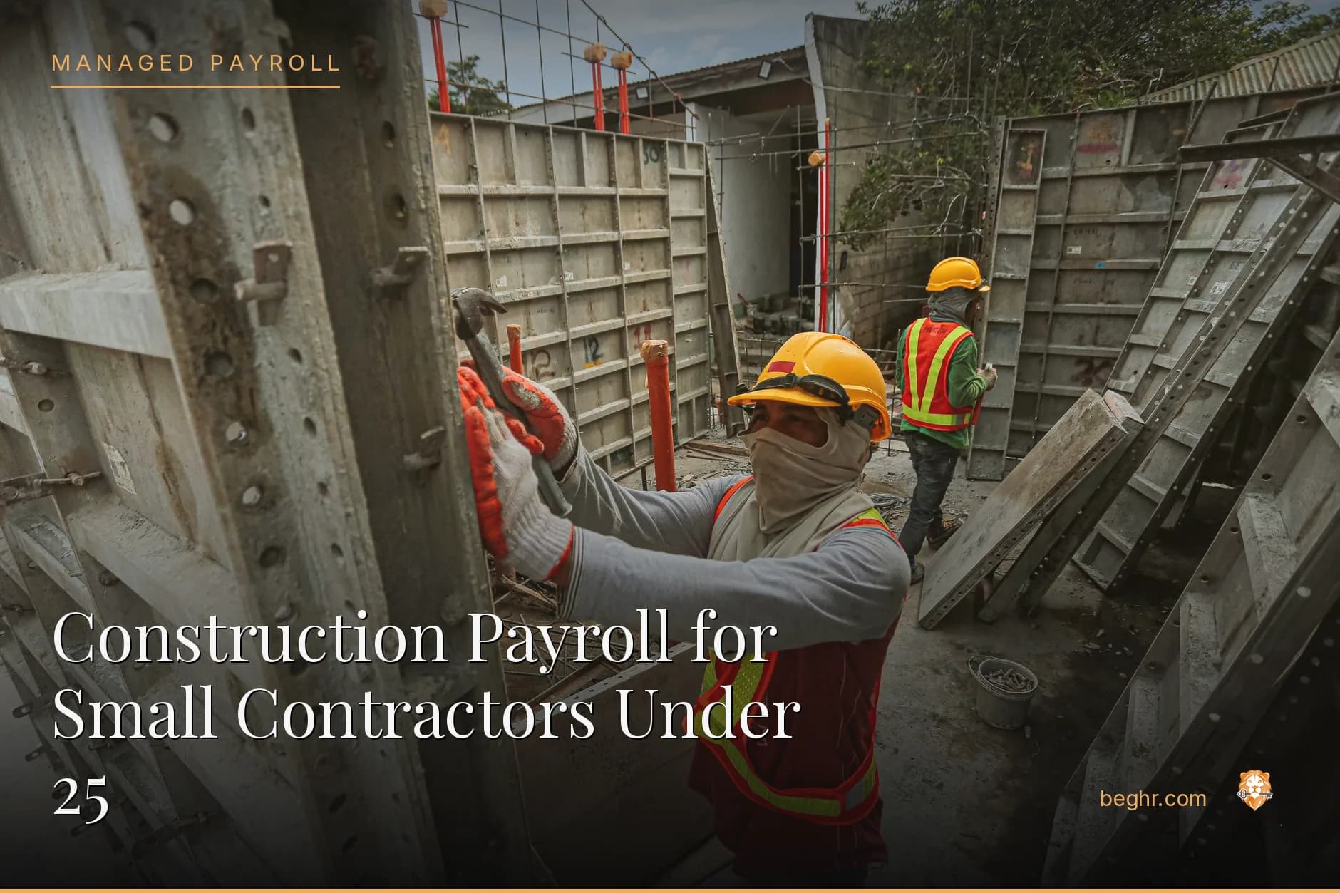 A real construction site, workers in hard hats and hi-vis vests reviewing plans