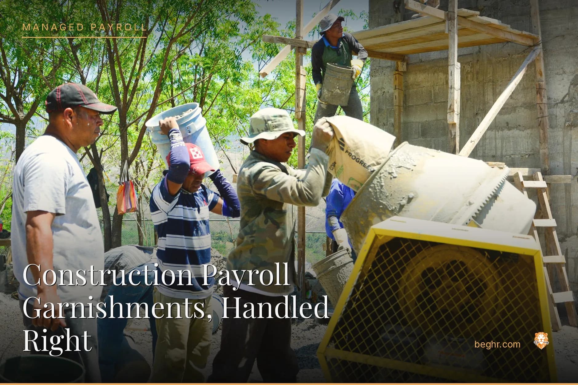 A real construction site, workers in hard hats and hi-vis vests reviewing plans