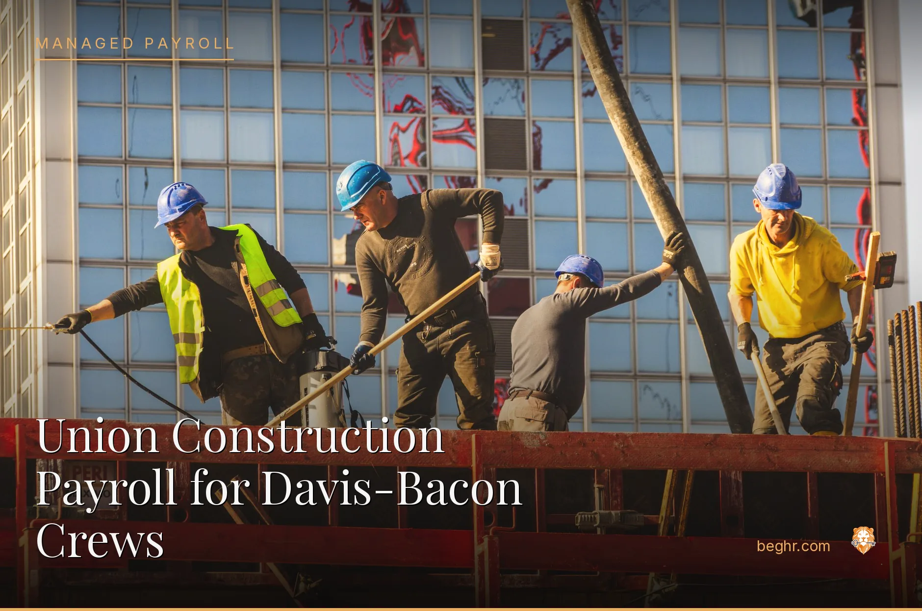 A real construction site, workers in hard hats and hi-vis vests reviewing plans