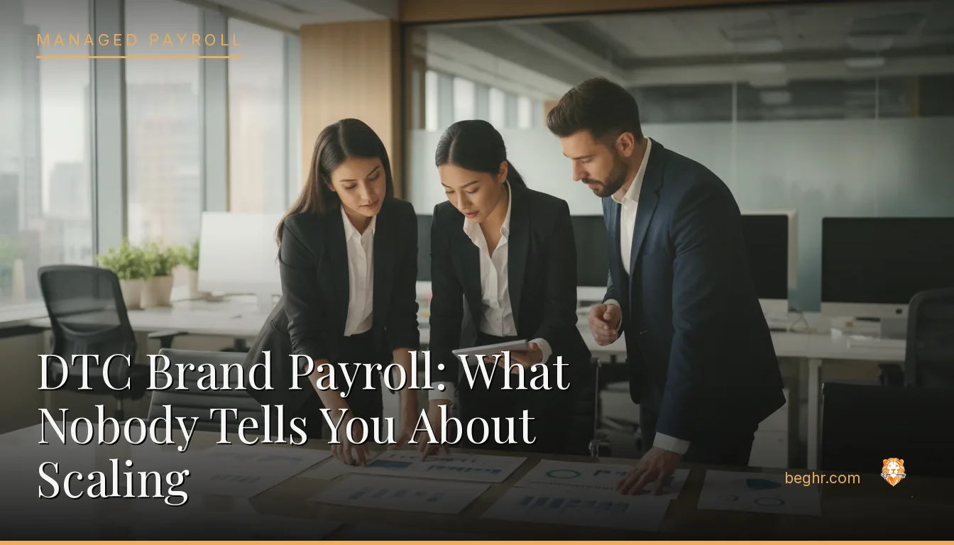 Business professionals reviewing payroll and HR documents in a bright modern office