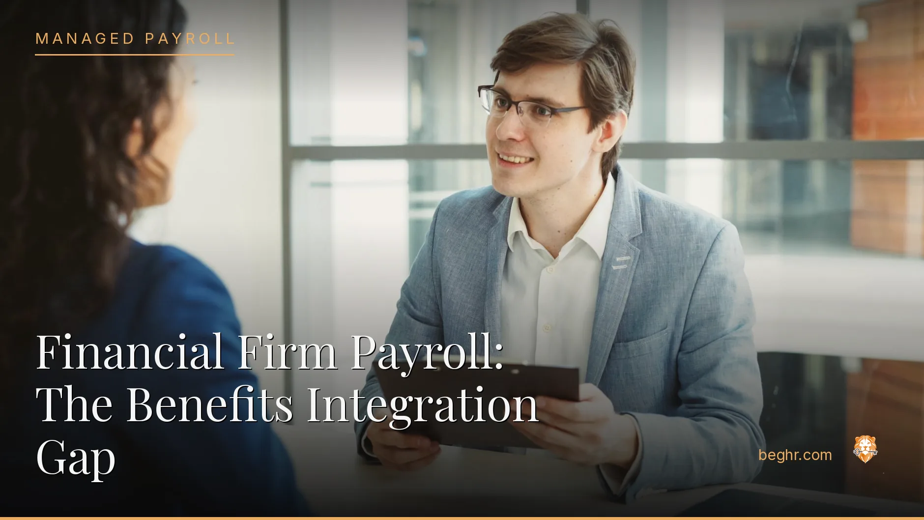 Business professionals reviewing payroll and HR documents in a bright modern office