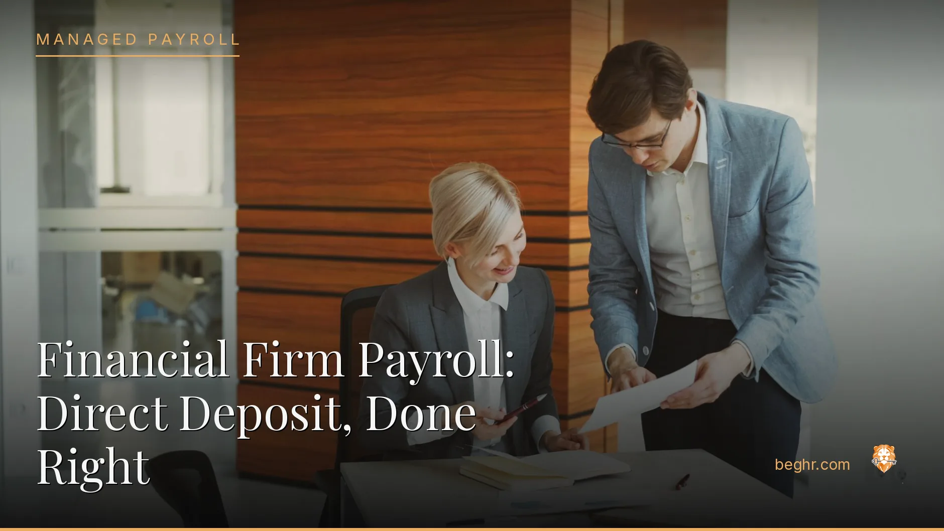 Business professionals reviewing payroll and HR documents in a bright modern office