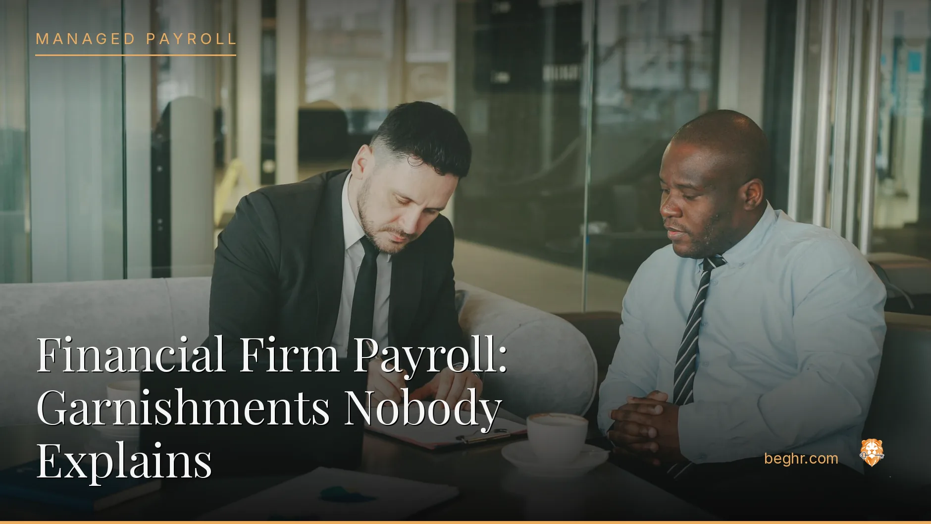 Business professionals reviewing payroll and HR documents in a bright modern office