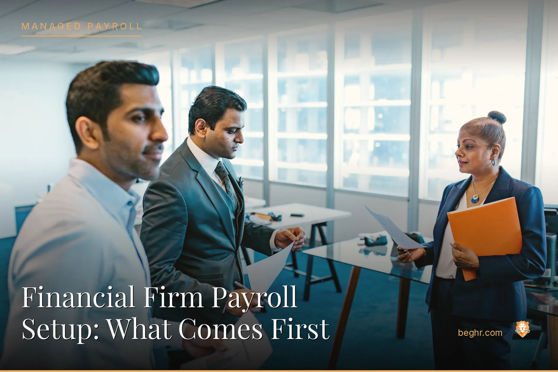 Business professionals reviewing payroll and HR documents in a bright modern office