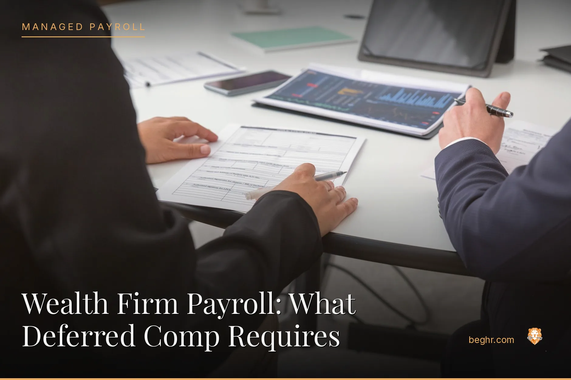Business professionals reviewing payroll and HR documents in a bright modern office