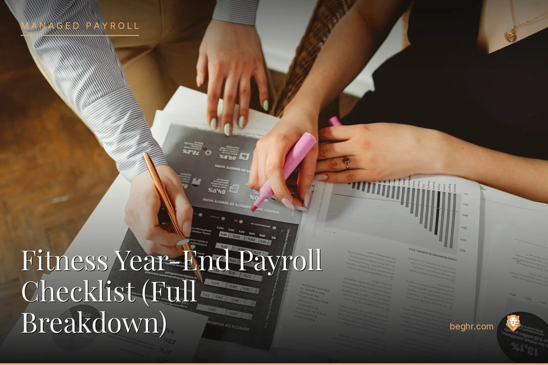 Business professionals reviewing payroll and HR documents in a bright modern office