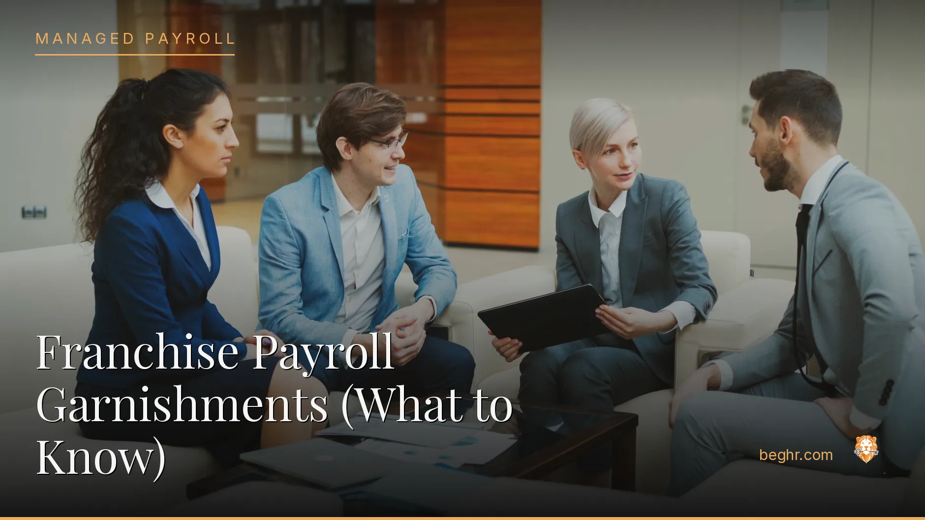 Business professionals reviewing payroll and HR documents in a bright modern office
