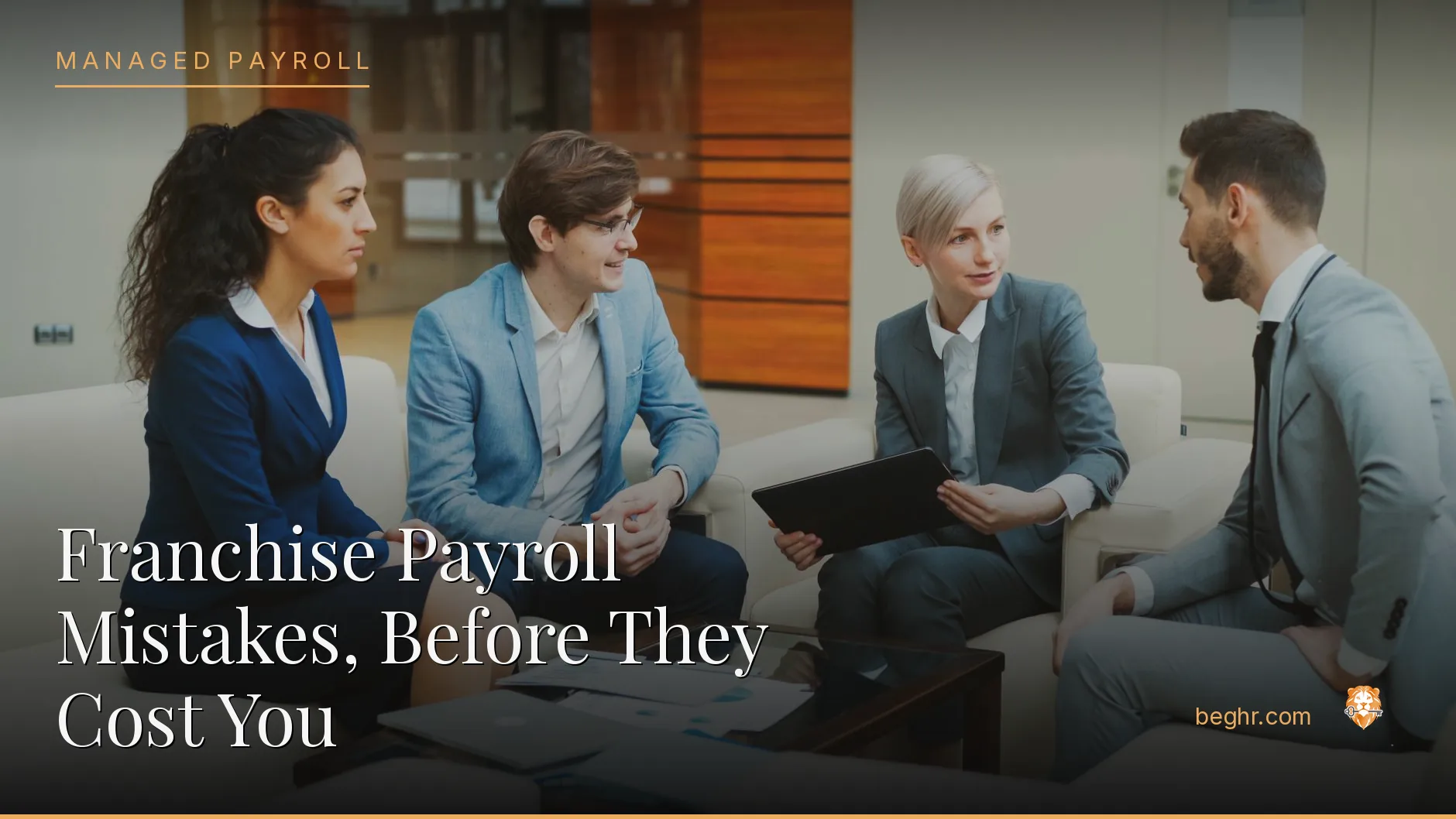 Business professionals reviewing payroll and HR documents in a bright modern office