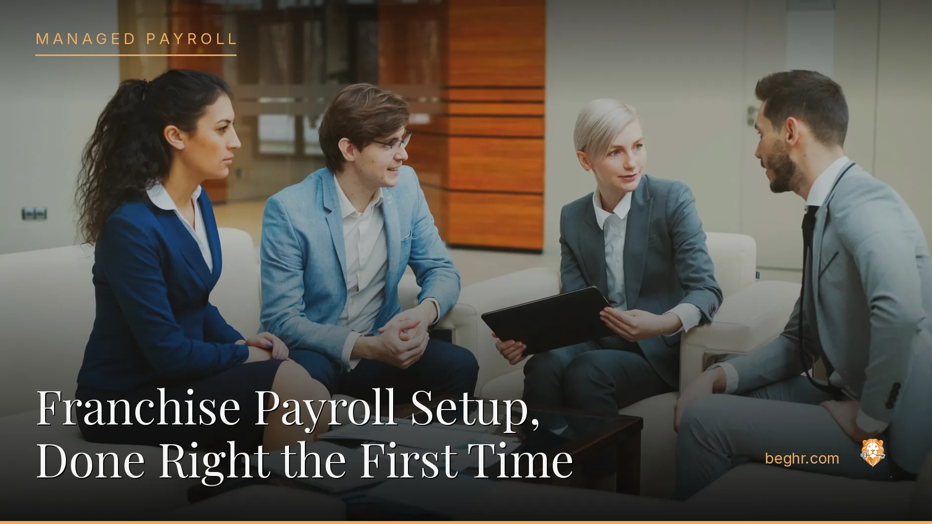 Business professionals reviewing payroll and HR documents in a bright modern office