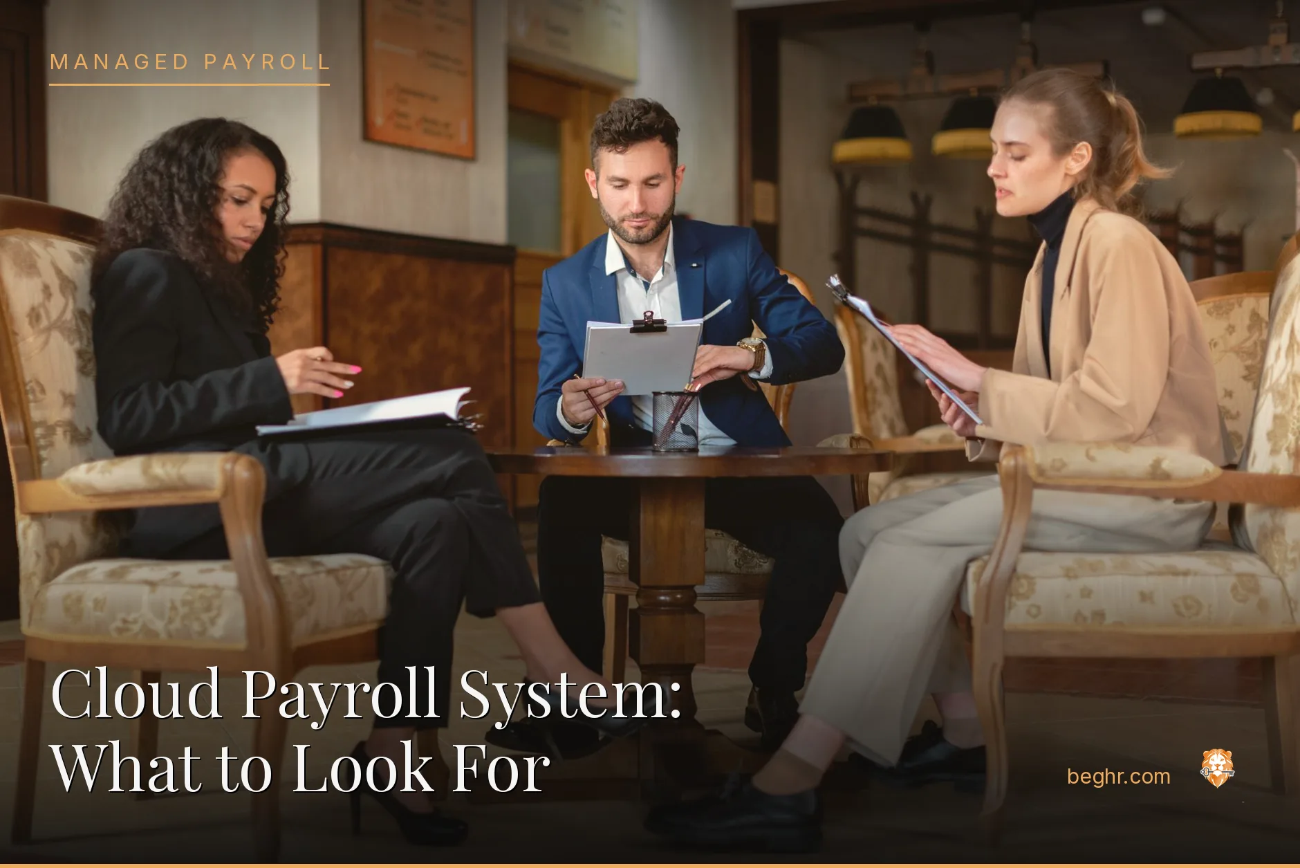 Business professionals reviewing payroll and HR documents in a bright modern office
