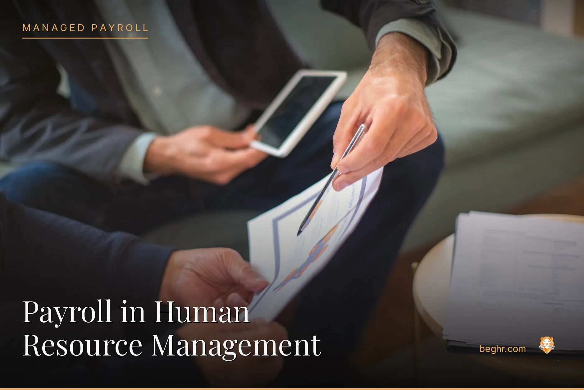 Business professionals reviewing payroll and HR documents in a bright modern office
