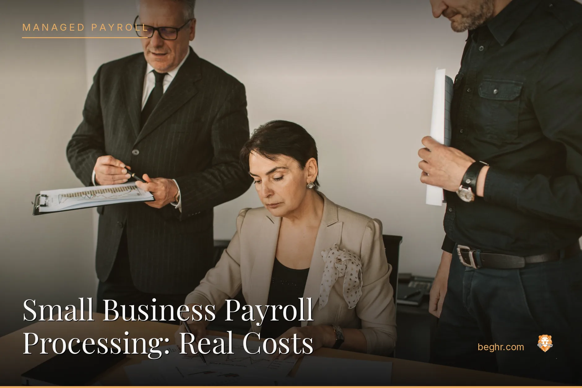 Business professionals reviewing payroll and HR documents in a bright modern office