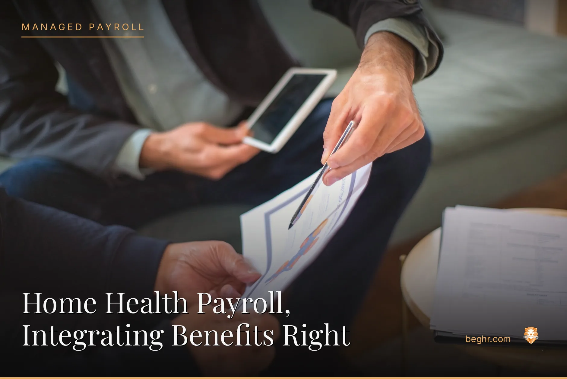 Business professionals reviewing payroll and HR documents in a bright modern office