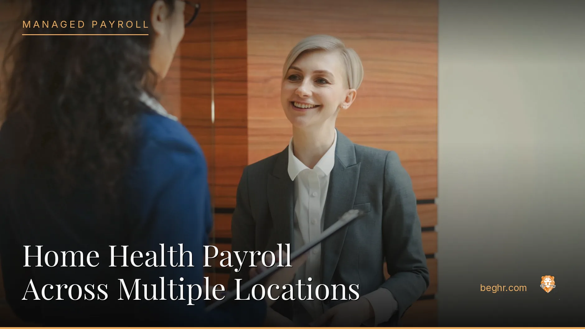 Business professionals reviewing payroll and HR documents in a bright modern office