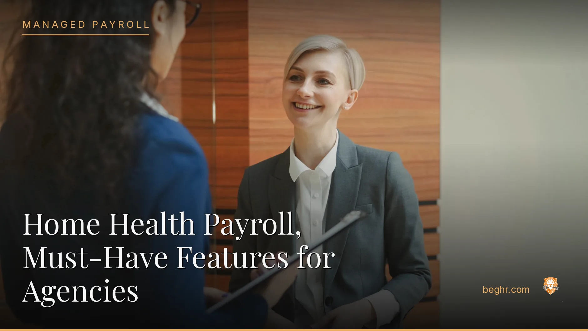 Business professionals reviewing payroll and HR documents in a bright modern office