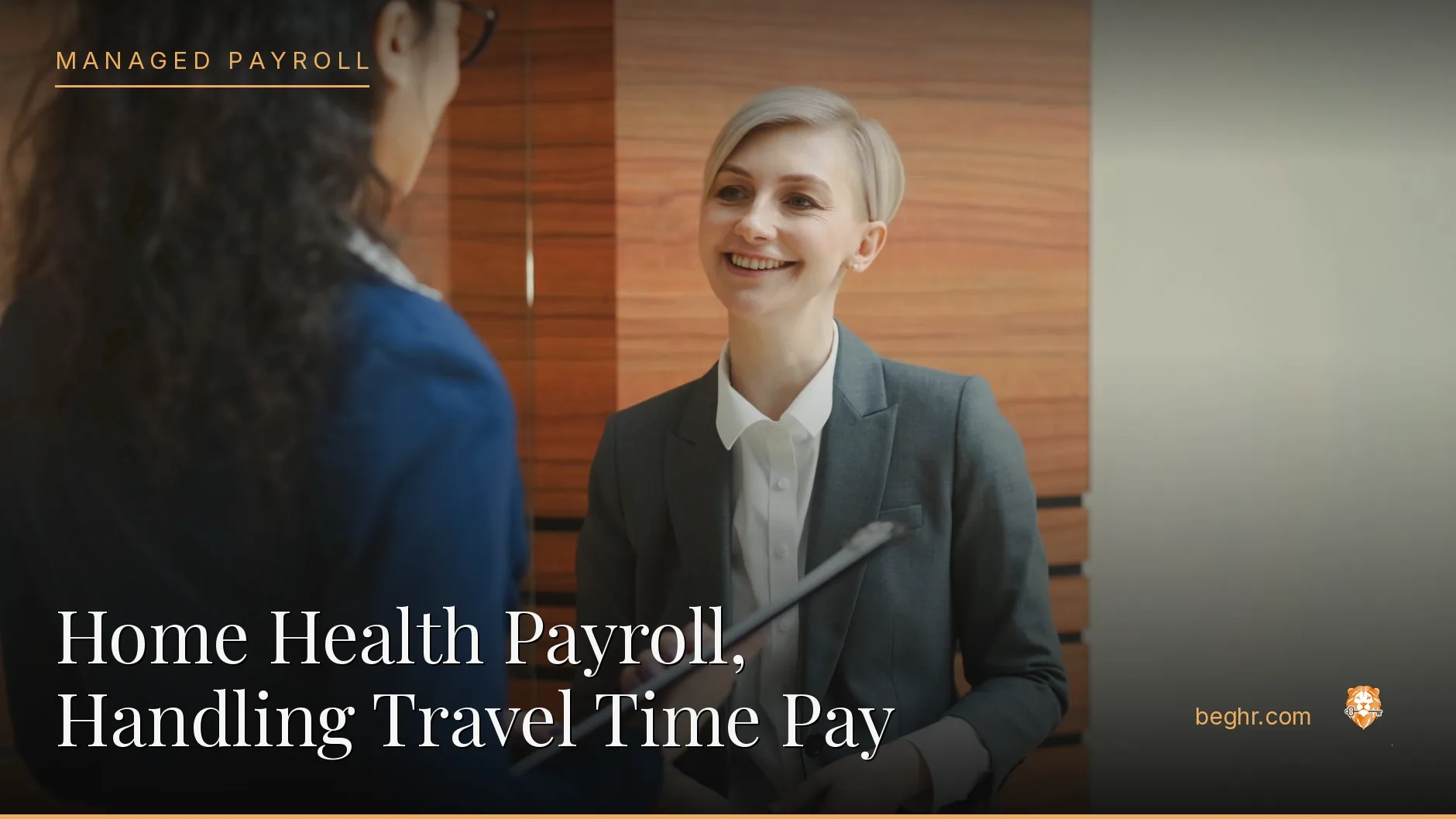 Business professionals reviewing payroll and HR documents in a bright modern office