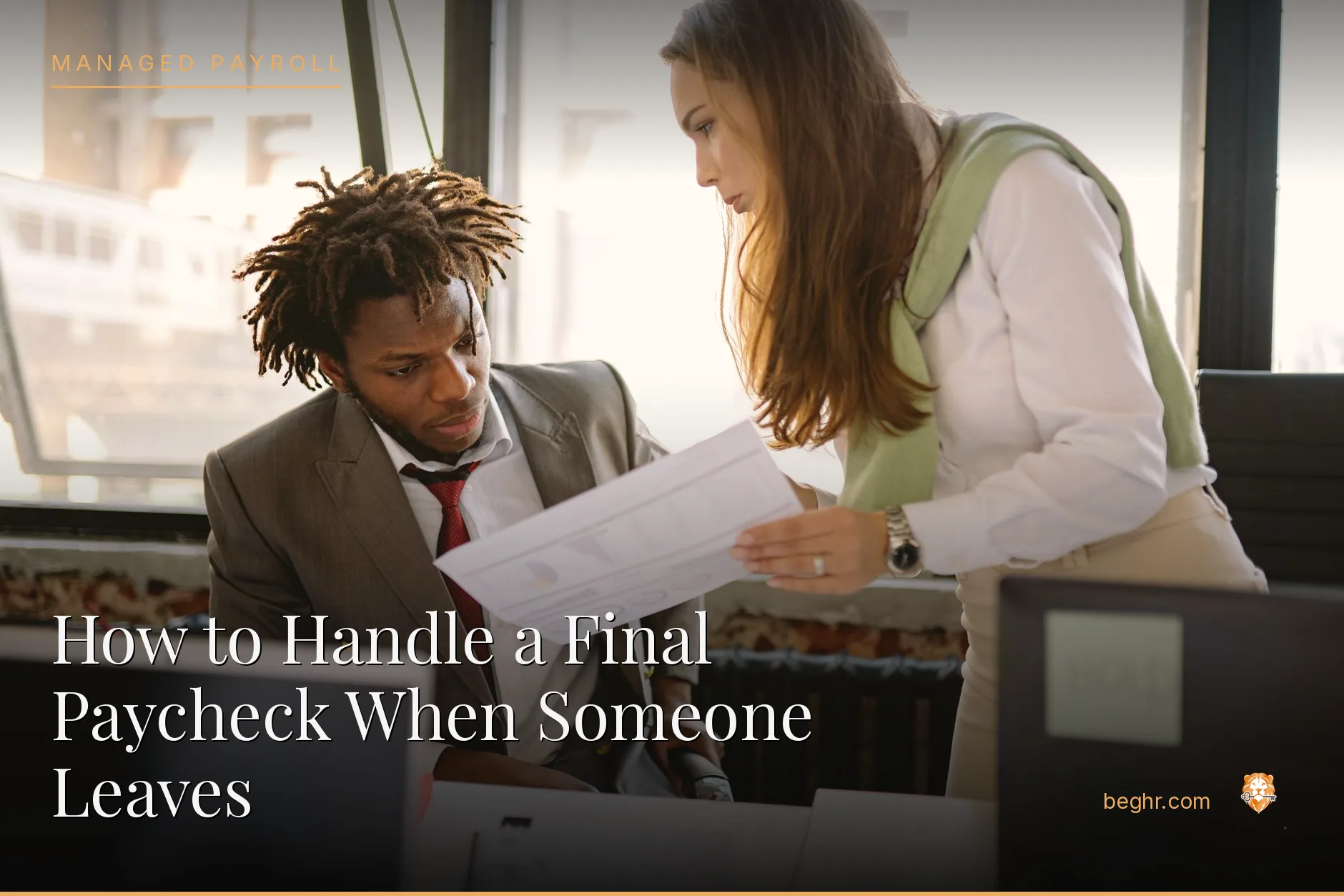 Business professionals reviewing payroll and HR documents in a bright modern office