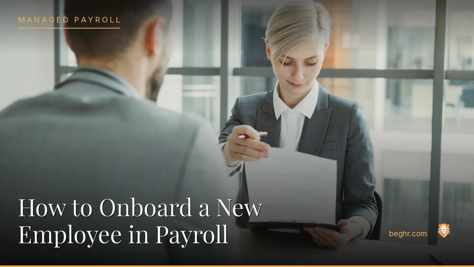 Business professionals reviewing payroll and HR documents in a bright modern office