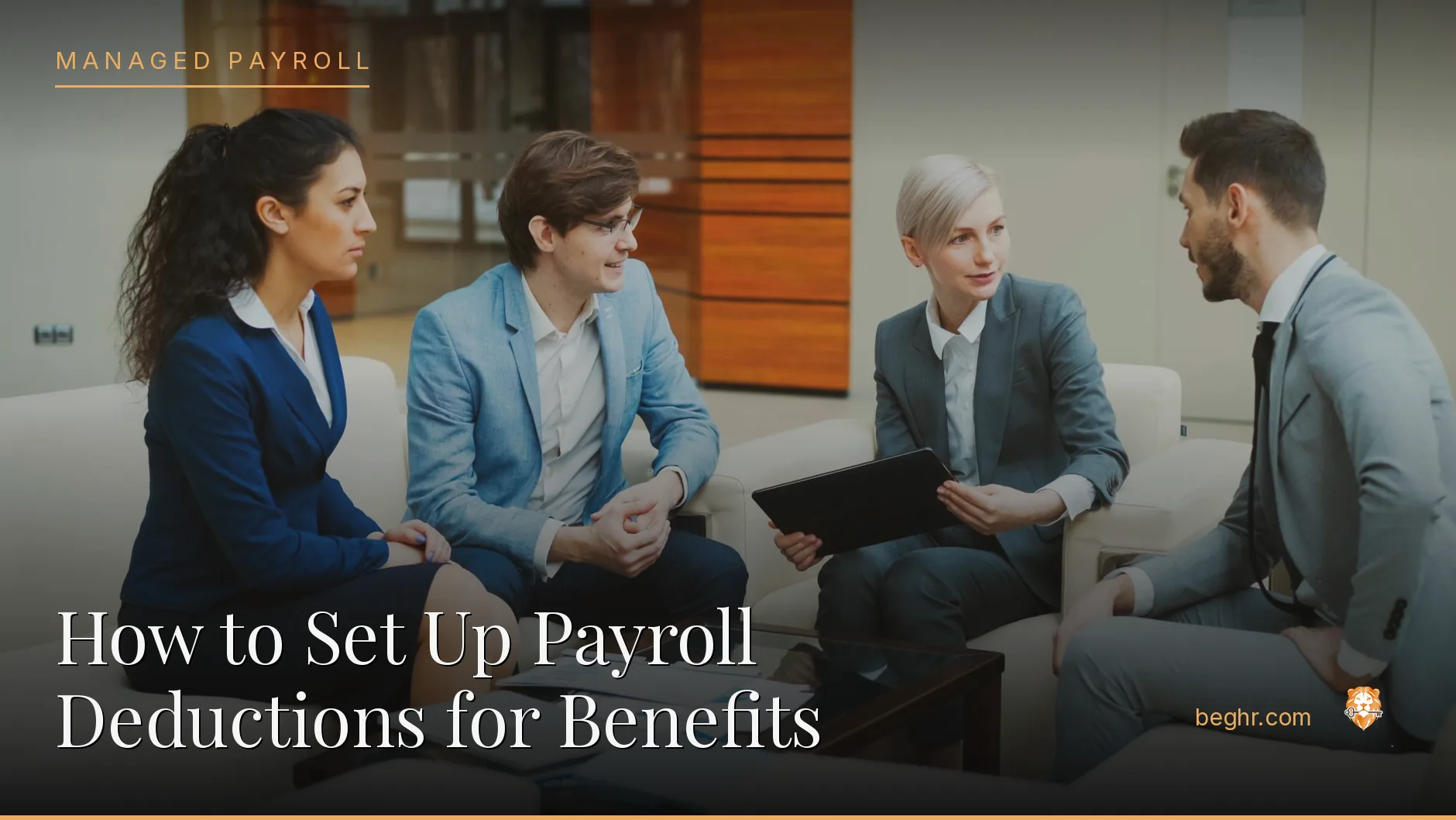 Business professionals reviewing payroll and HR documents in a bright modern office