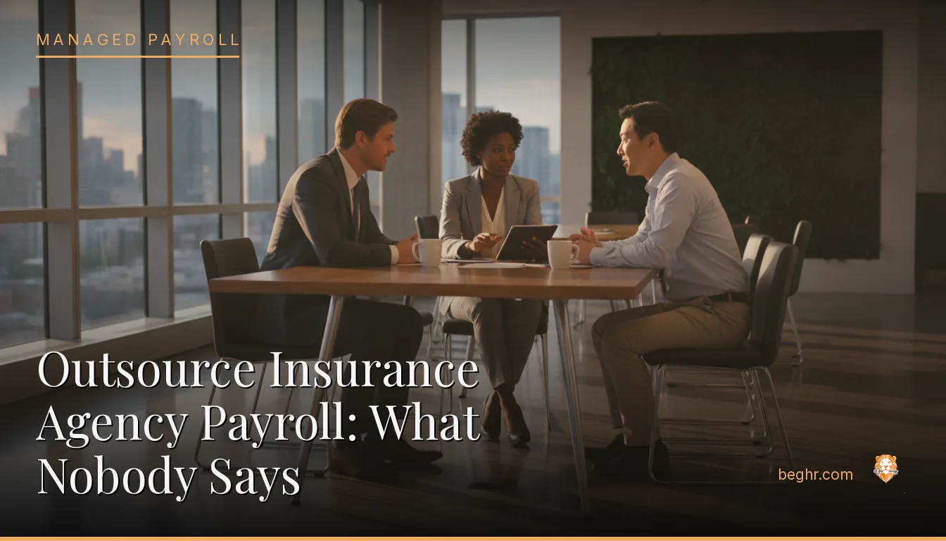 Insurance professionals meeting with a client in a modern office