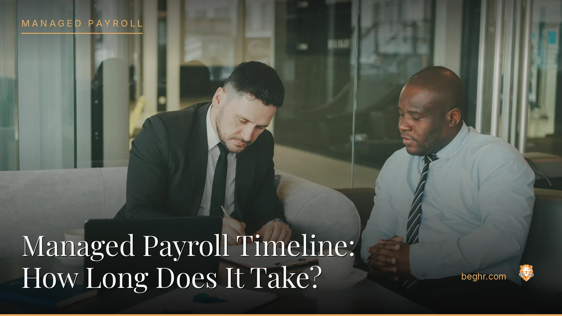 Business professionals reviewing payroll and HR documents in a bright modern office