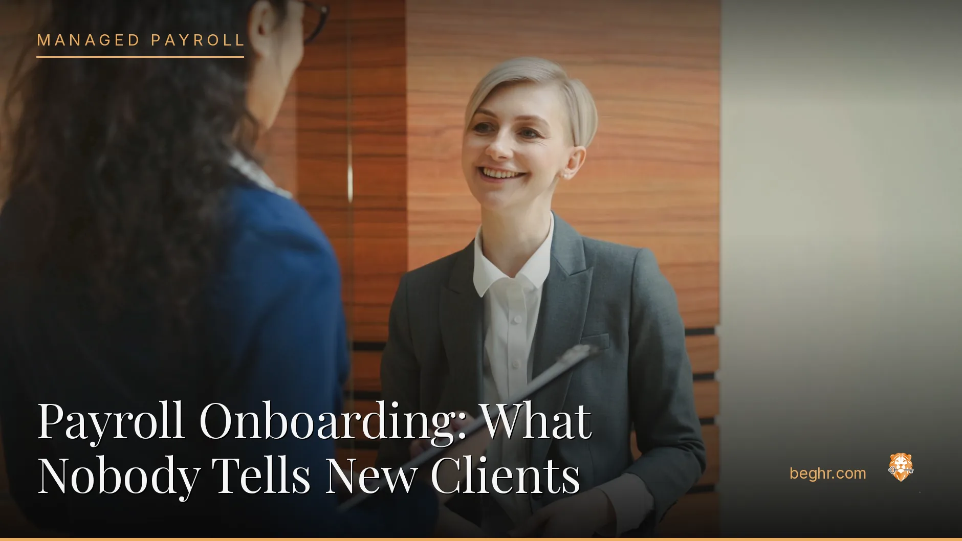 Business professionals reviewing payroll and HR documents in a bright modern office