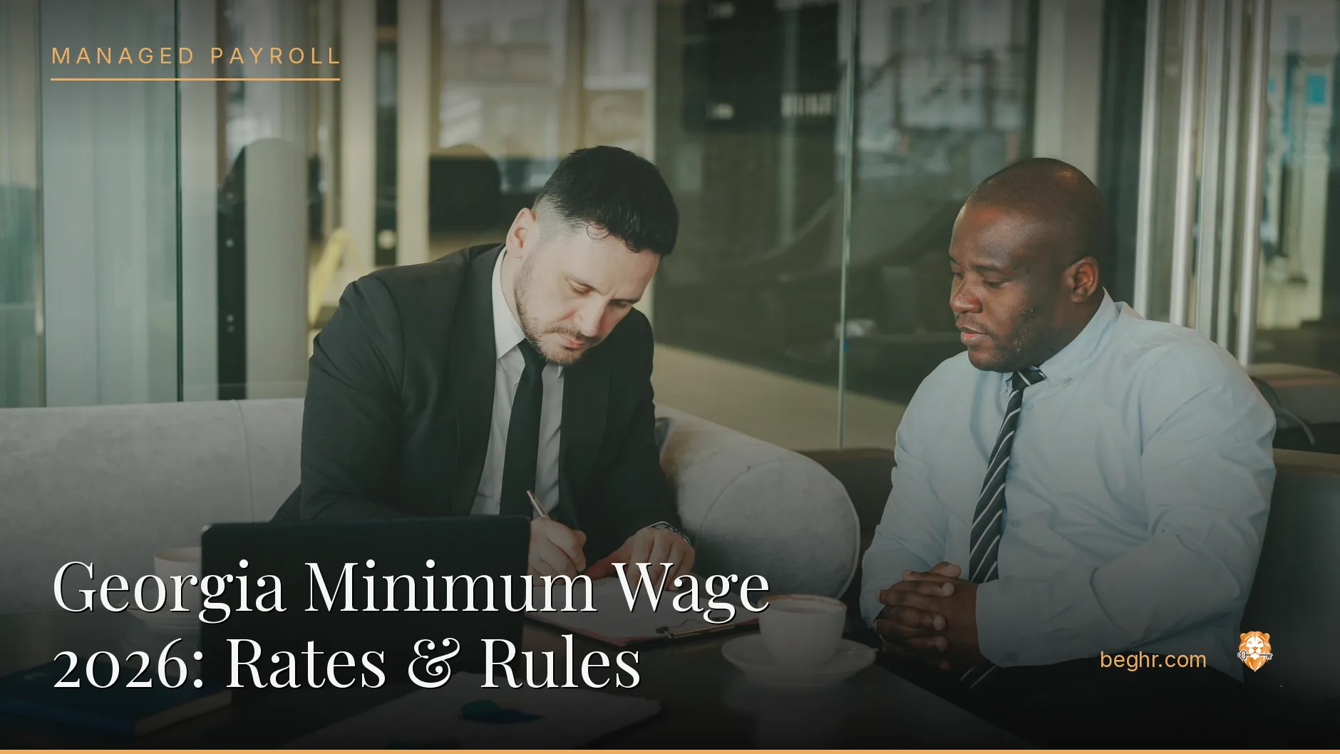 Business professionals reviewing payroll and HR documents in a bright modern office