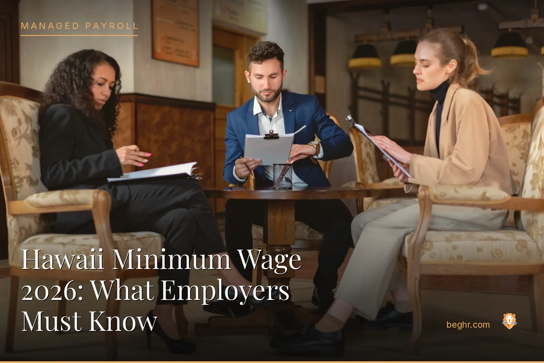 Business professionals reviewing payroll and HR documents in a bright modern office