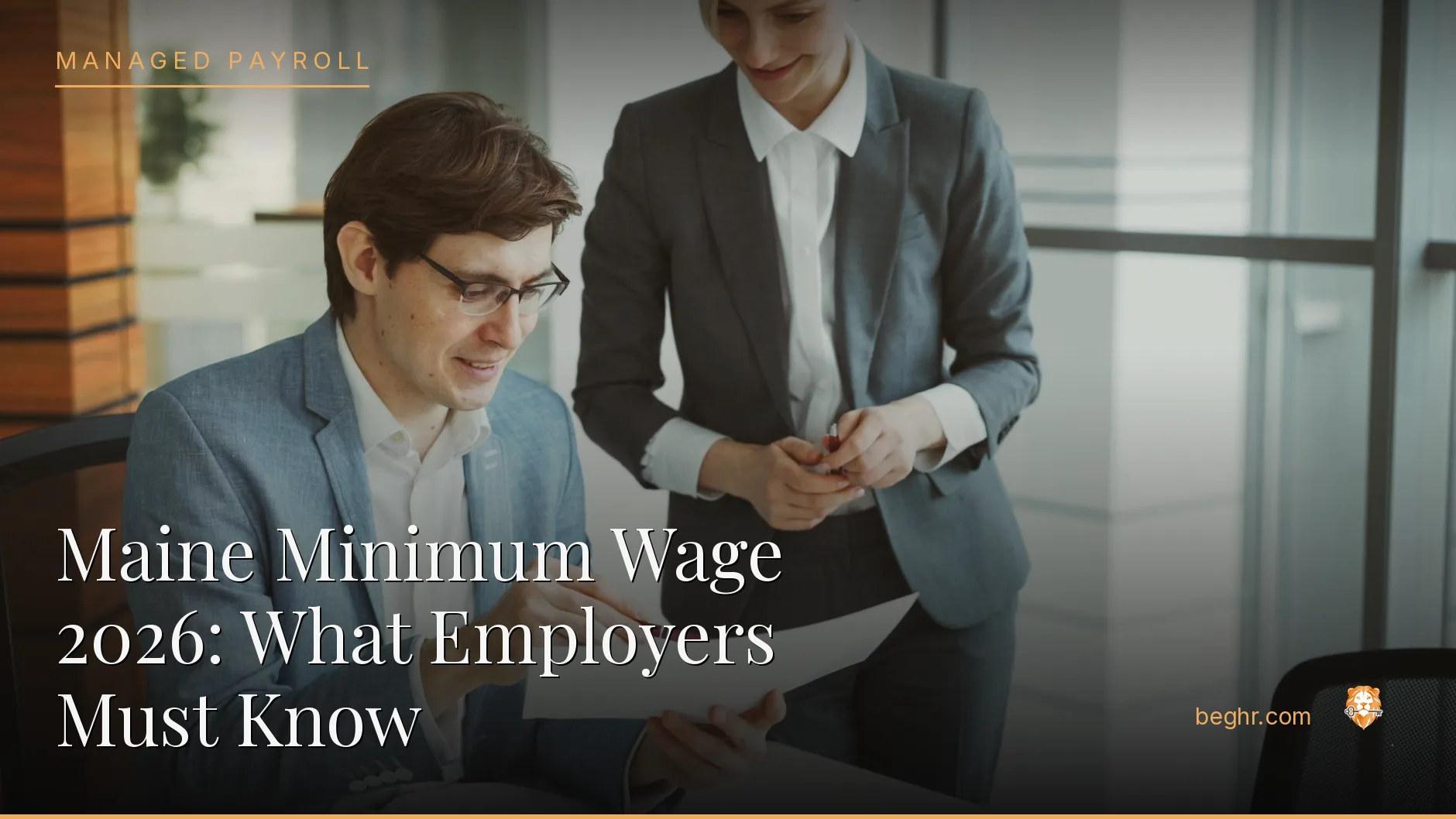Business professionals reviewing payroll and HR documents in a bright modern office