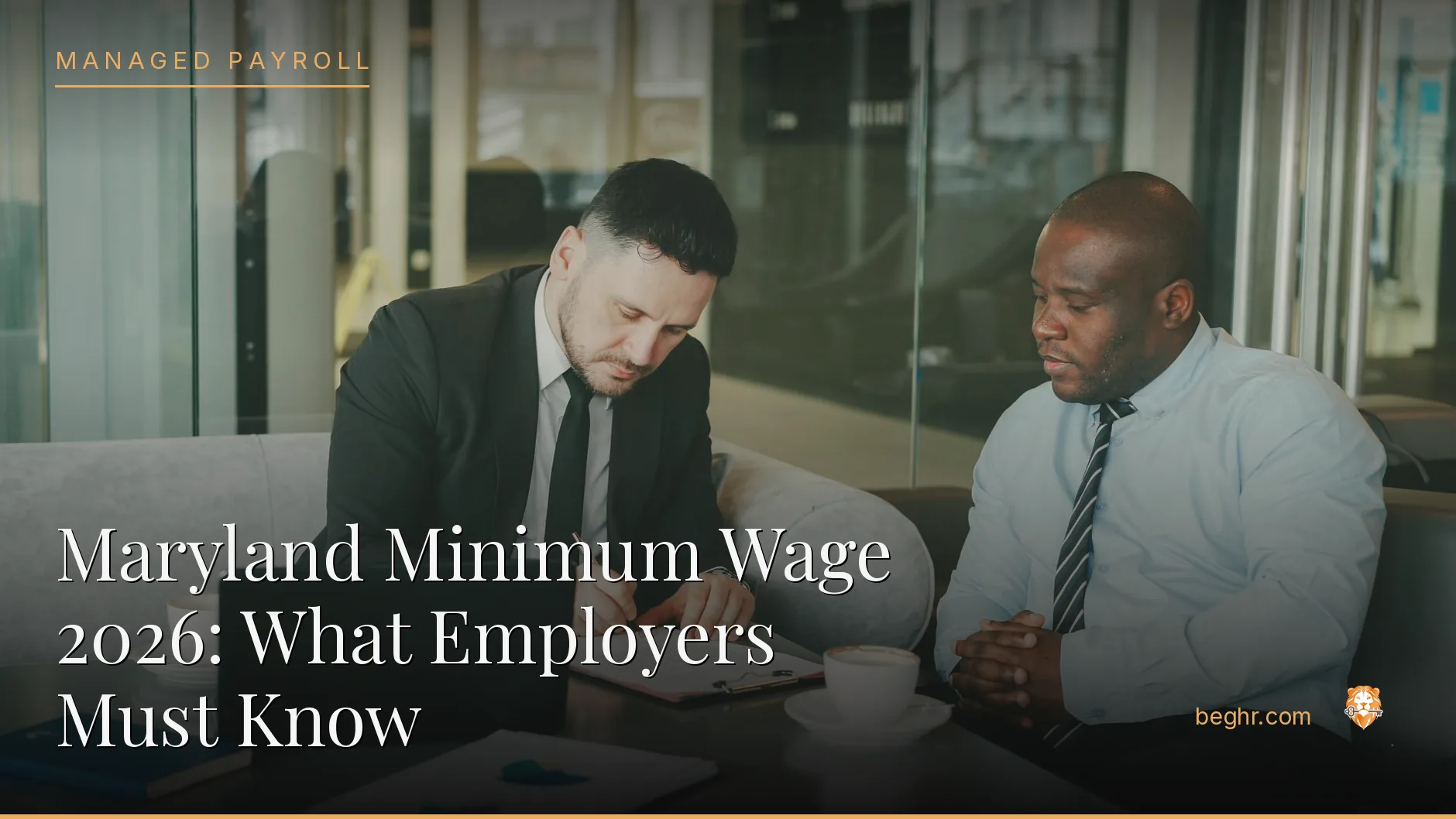 Business professionals reviewing payroll and HR documents in a bright modern office