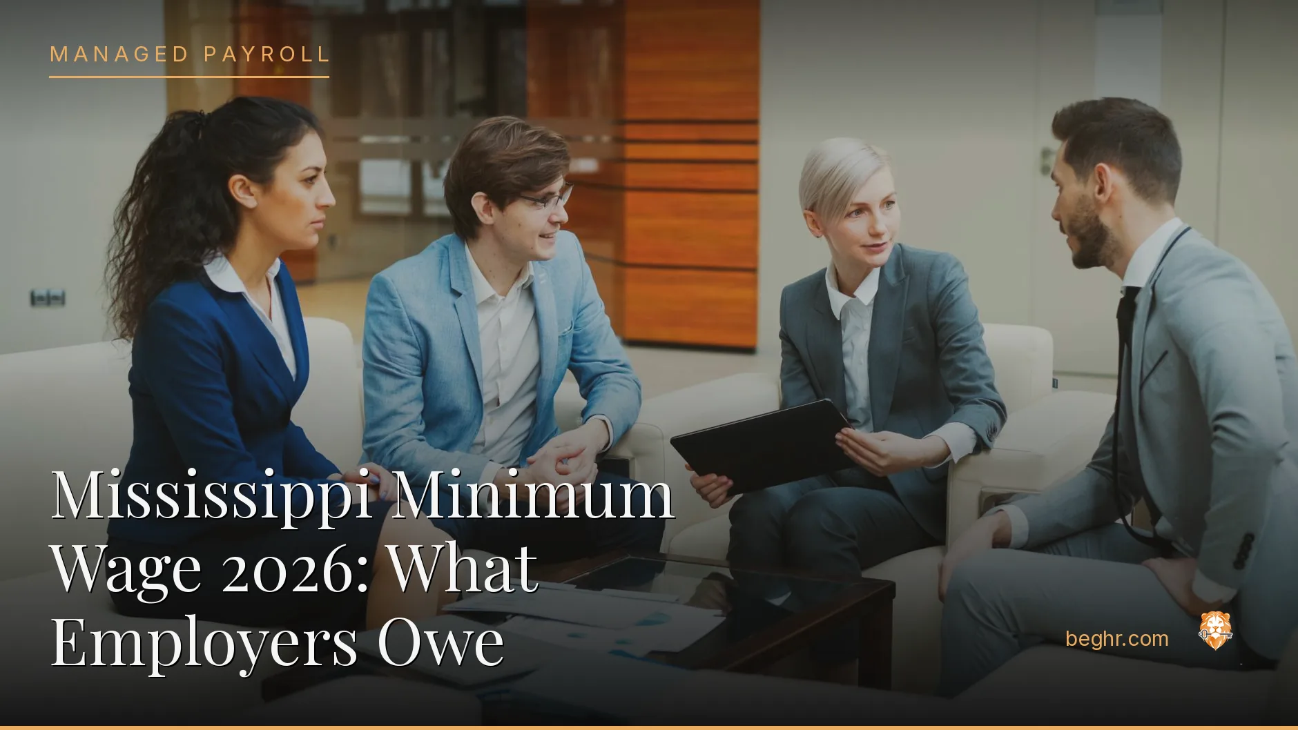 Business professionals reviewing payroll and HR documents in a bright modern office
